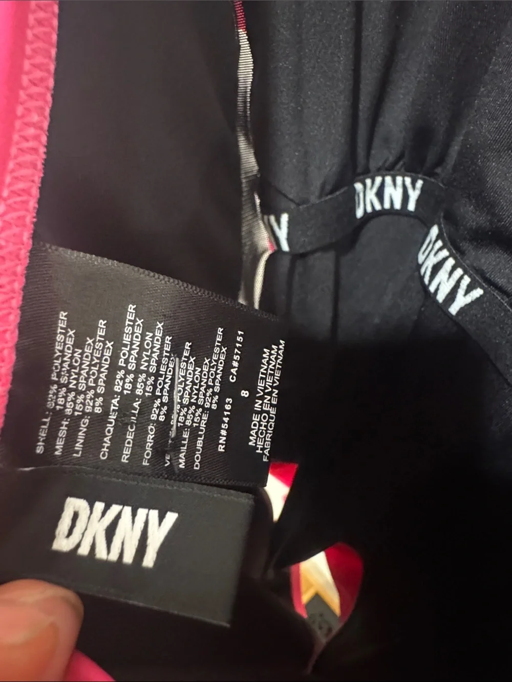 Flattering Neon DKNY Black and Hot Pink One piece swimsuit with Ruching - Picture 2 of 4